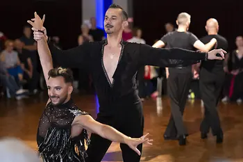 Two men in a Latin dance competition at the EuroGames 2023 in Switzerland